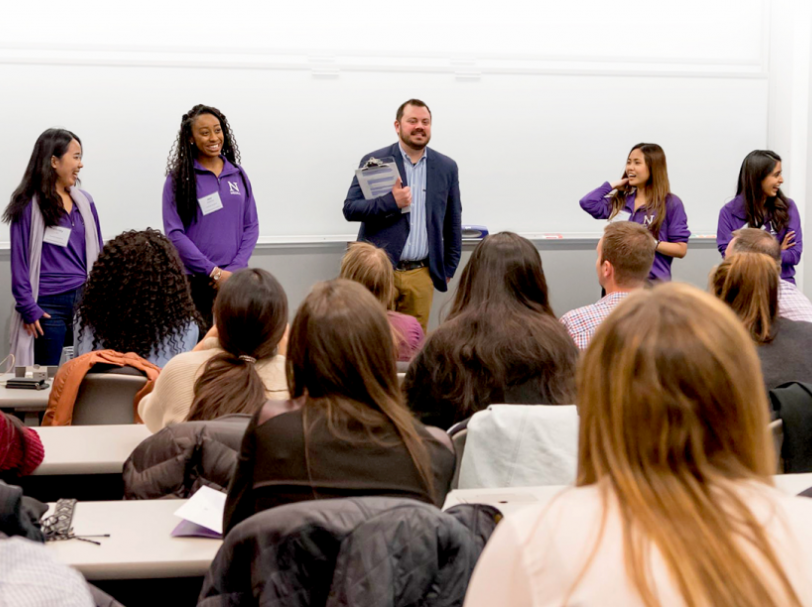 A group of people in the classroom